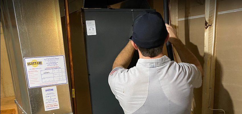 Man installing Furnace in St Peters MO